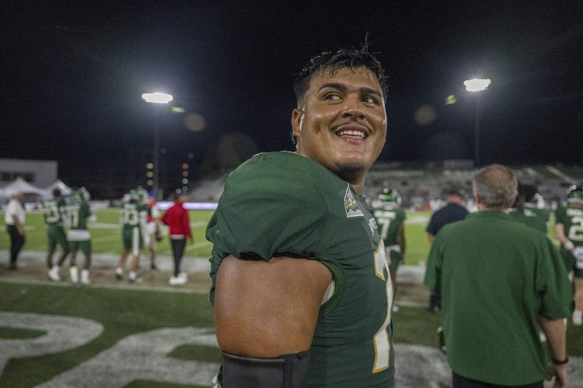 Sacramento State Hornets offensive lineman Jose Soto (73) smiles as his team wins 49-28 against the Mercyhurst Lakers on Saturday at Hornet Stadium.