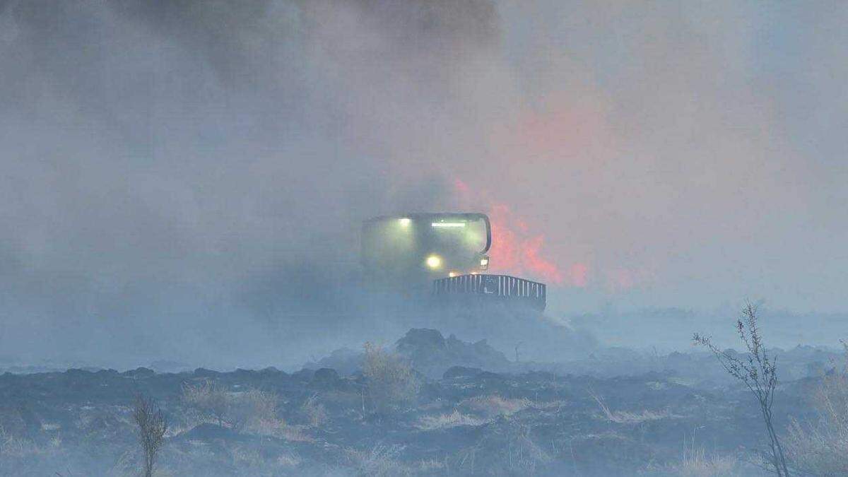 Cal Fire personnel work to create a dozer line ahead of a wildfire in eastern California on Sunday, March 30, 2025. The Silver Fire has burned roughly 1,250 acres near Bishop and was 0% contained on Monday.