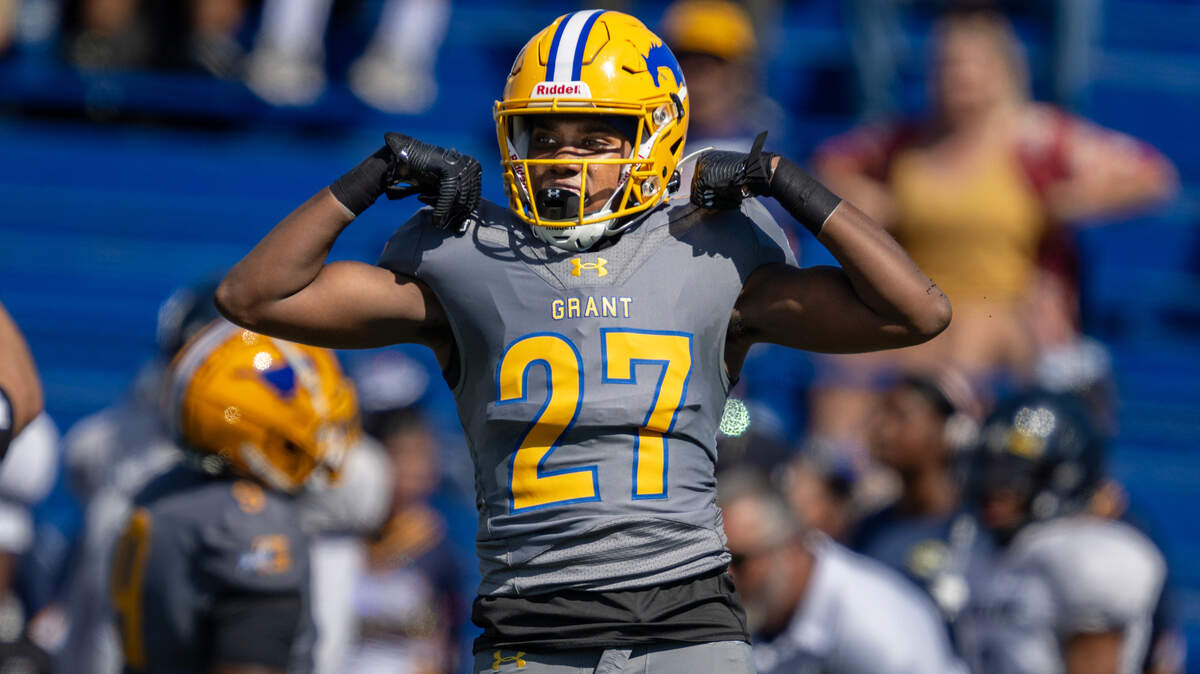 The Grant Pacers’ Xavier Worthington (27) flexes after sacking Inderkum Tigers quarterback Ricky Cole (6) in the second half on Saturday at Grant High School.