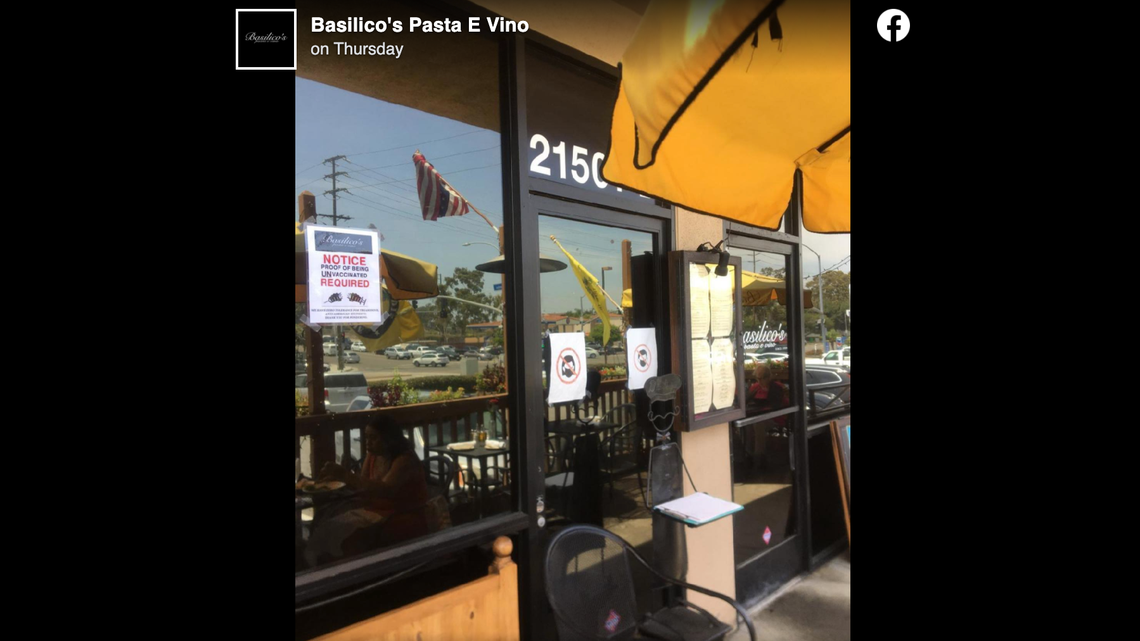 Basilico’s Pasta e Vino in Huntington Beach put up signs saying patrons have to be unvaccinated. Owner, Tony Roman, said he was fighting “harmful policies.”