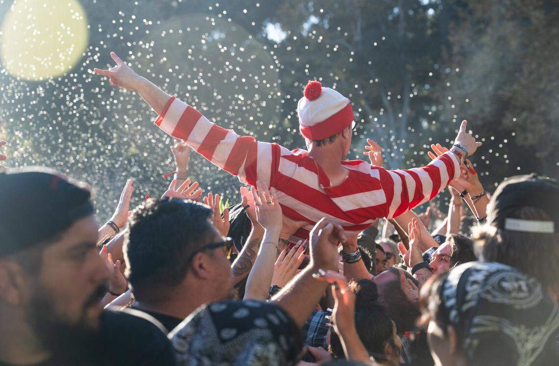 Where’s Waldo? He’s crowdsurfing during the Aftershock festival on Friday, Oct. 3, 2025, in Discovery Park in Sacramento.  
