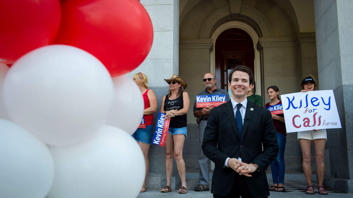 Assemblyman Kevin Kiley, R-Rocklin, stands with supporters on the west steps of the Capitol on Saturday, July 10, 2021, to officially kick off his campaign to replace Gov. Gavin Newsom in the recall election.