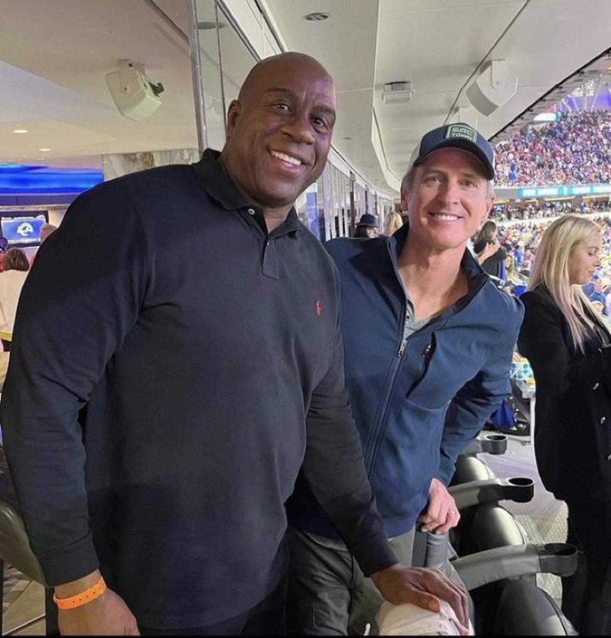 An image tweeted by Earvin “Magic” Johnson shows Johnson and California Gov. Gavin Newsom without masks in a luxury suite at SoFi Stadium in Inglewood for the NFC Championship football game on Jan. 30, 2022.