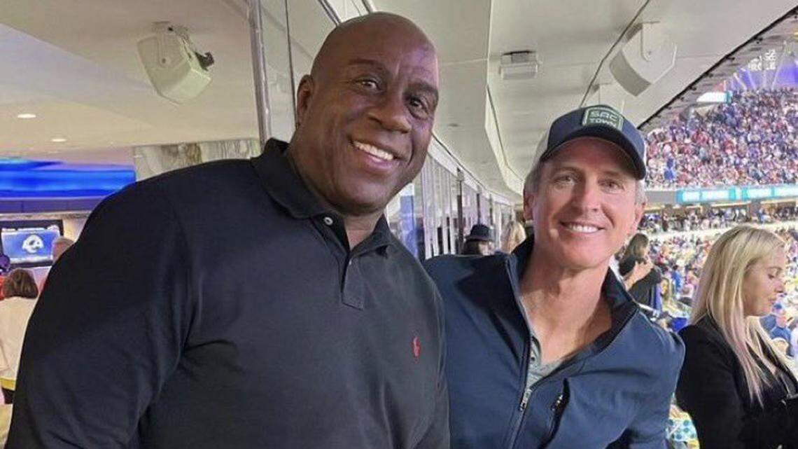 An image tweeted by Earvin “Magic” Johnson shows him and California Gov. Gavin Newsom without masks in a luxury suite at SoFi Stadium in Southern California last month.