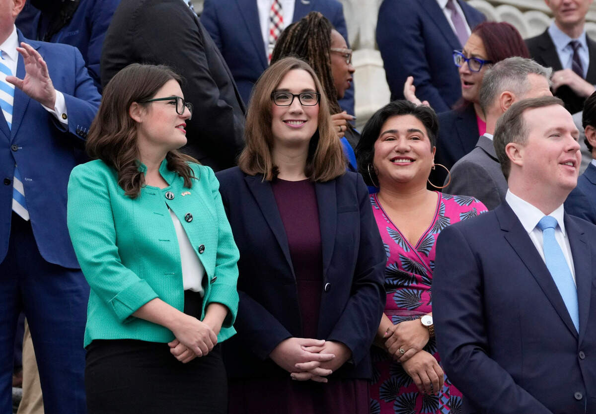 Newly-elected member of the U.S. House of Representatives Rep. Sarah McBride, D-Del., the first openly transgender person elected to serve in the United States Congress, stands with newly-elected Rep. Emily Randall, D-Wash., right, and Rep. Sarah Elfreth, D-Md., left, before the official new member photo was taken on the steps of the U.S. Capitol on Nov. 15 in Washington, D.C.