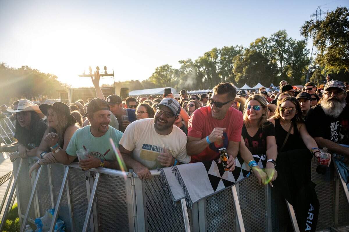 Fans watch Brian Kelley perform on the Visit Sacramento Stage during Sacramento’s first-ever GoldenSky country music festival Saturday, Oct. 15, 2022, at Discovery Park. The two-day event featured headliners Tim McGraw and Sam Hunt, as well as Brothers Osborne, Midland, Carly Pearce and more.