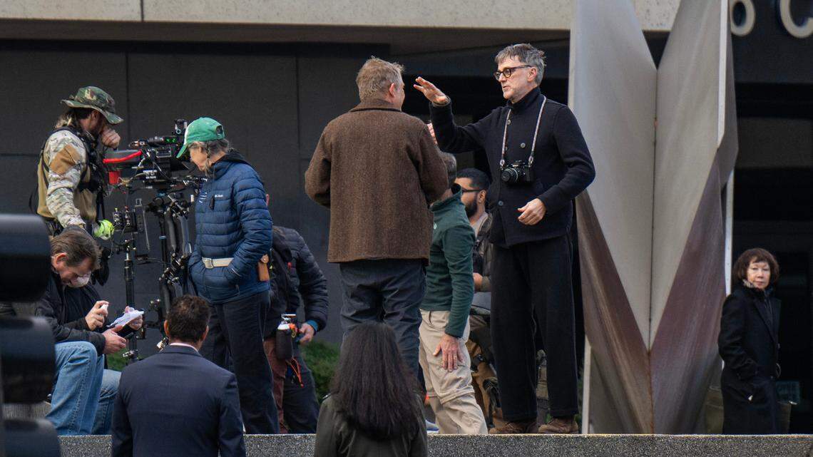 Director Paul Thomas Anderson prepares to film a scene for an upcoming movie at the Sacramento County Administration Building in downtown on Saturday.