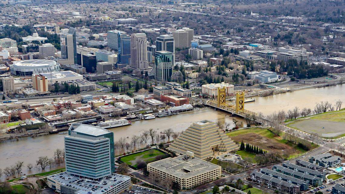 The Sacramento River splits Sacramento, top, and West Sacramento. A survey ranks Sacramento among the best cities for business and finance graduates to call home.