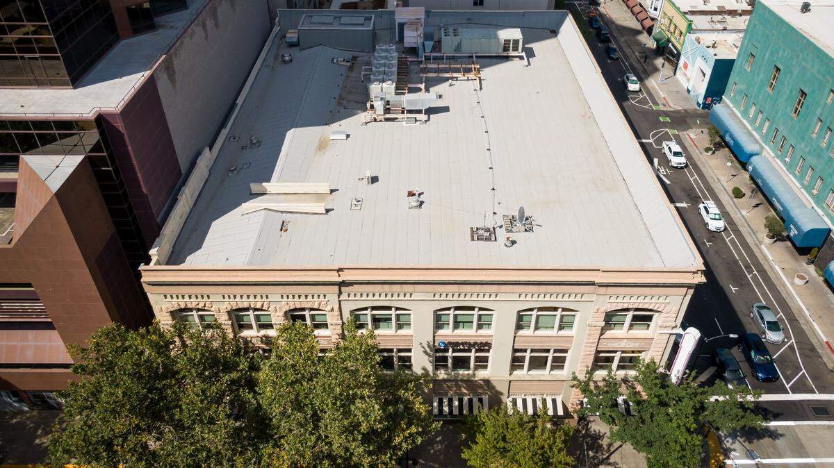 The building on the northwest corner of 9th and K streets is seen in a drone photo Tuesday, Aug. 1, 2023, in downtown Sacramento.