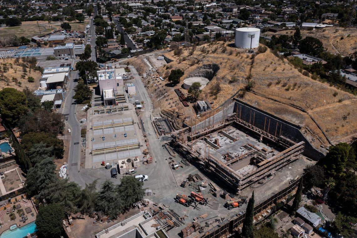 Gov. Gavin Newsom visited the Antioch Water Treatment Plant on Thursday to announce a water supply strategy for a hotter and drier California. The city’s Brackish Water Desalination Project, the first desalination project to be built in the Delta, is under construction at right.