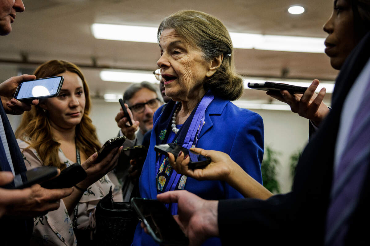 U.S. Sen. Dianne Feinstein, D-California, is surrounded by reporters on Feb. 14, 2023, on Capitol Hill in Washington, D.C., announcing that she will retire from the Senate at the end of her term in 2024.