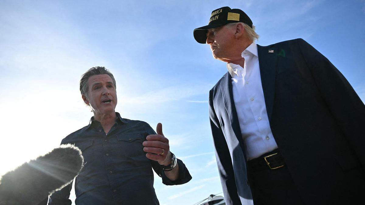 President Donald Trump, right, and California Gov. Gavin Newsom speak to the media upon arrival at Los Angeles International Airport in Los Angeles on Jan. 24, 2025.