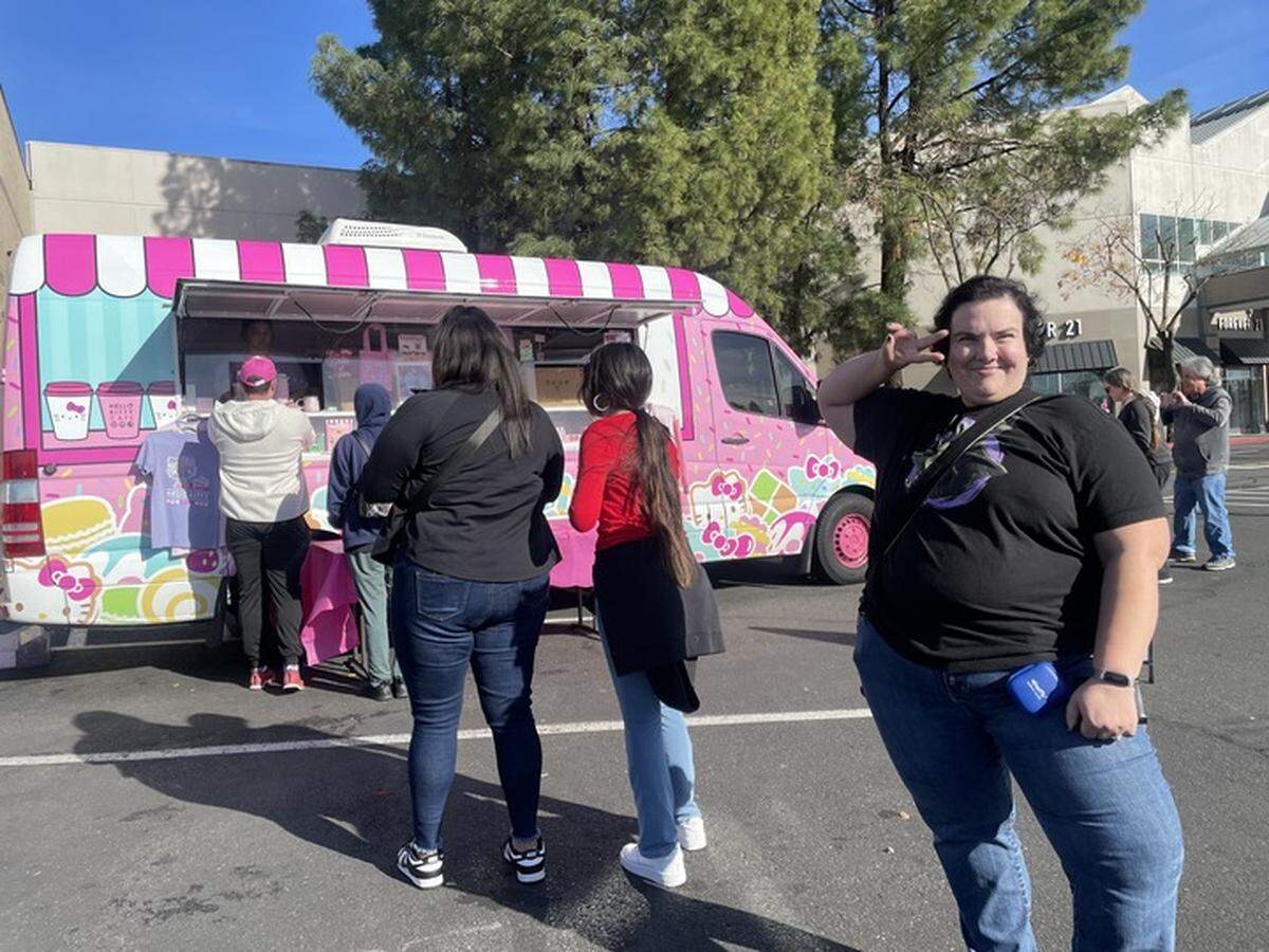 Suzanne Ansell awaits her chance to buy Hello Kitty merchandise from their pop-up truck at Arden Fair mall in Sacramento on Saturday.