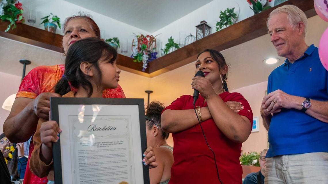 From left, Moon Begum, Aliyah Begum, Naz Begum and Sacramento City Councilmember Roger Dickinson celebrate the first anniversary of Sammy’s Restaurant’s reopening on Saturday, July 19, 2025. Naz and her mother, Moon, purchased the Del Paso Boulevard diner and brought it back to life a year after its pandemic closure.