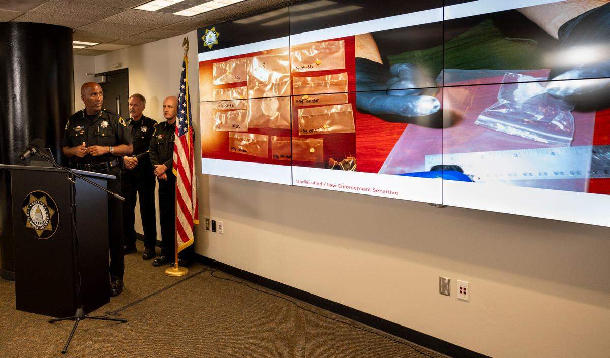 Sacramento County Sheriff Jim Cooper shows photos of fentanyl smuggled in by inmates during a press conference at the Main Jail on Thursday, Sept. 19, 2024. This year his deputies have confiscated 500 grams of fentanyl, which he says would be enough to kill the entire population of Elk Grove.