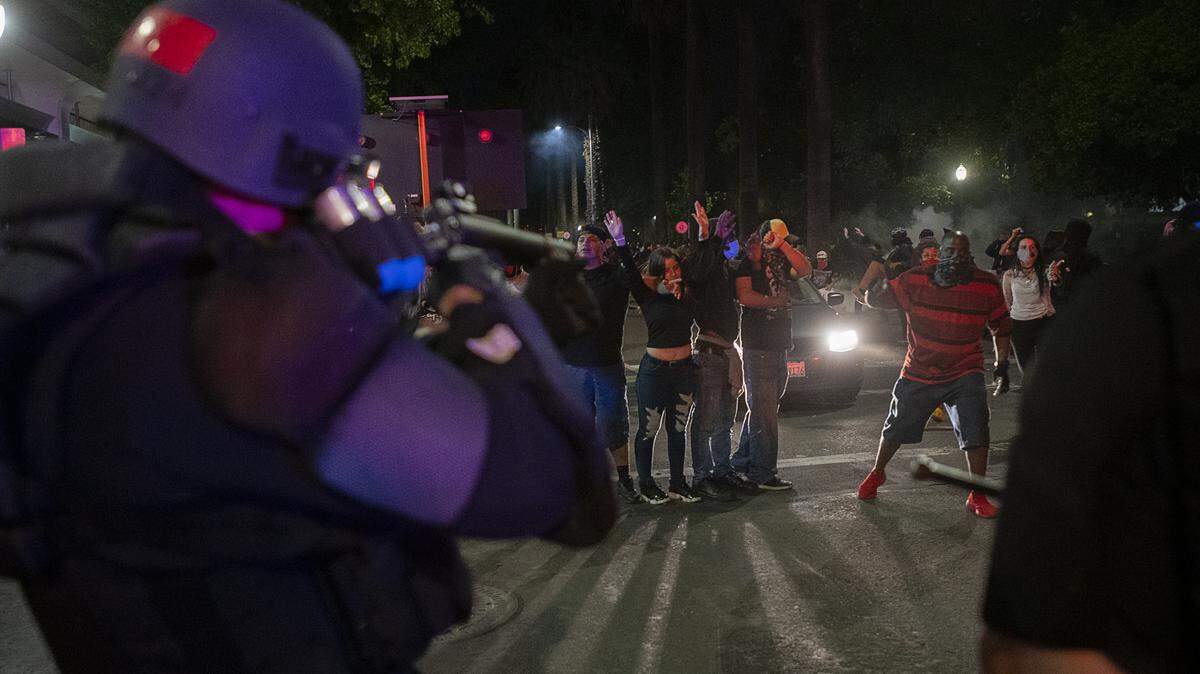Demonstrators face off with Sacramento police at L and 10th Streets during a protest over the death of George Floyd in 2020. The city spent more than $22 million settling lawsuits involving claims of police wrongdoing between 2019 and 2023, documents reviewed by The Sacramento Bee showed.