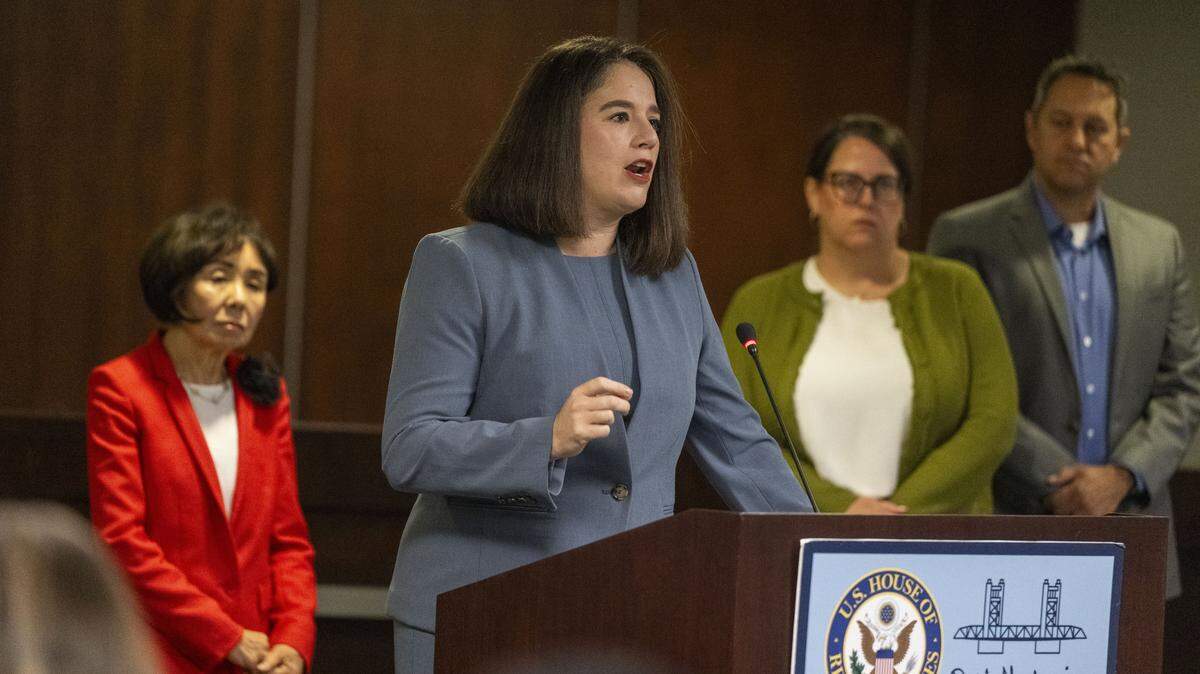 Jessica Altman, executive director of Covered California, speaks during a news conference on Friday, Oct, 3, 2025, at her Sacramento office. The event was held by U.S. Rep. Doris Matsui, D-Sacramento, left, about the congressional stalemate over healthcare that has led to the federal government shutdown.