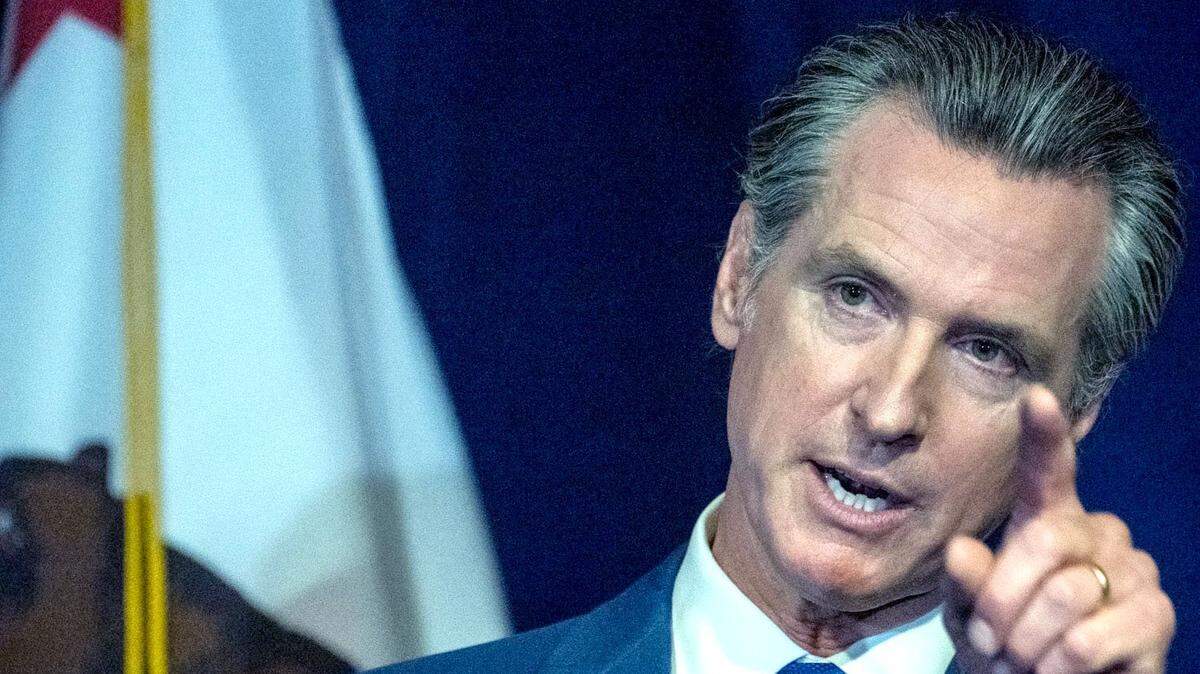 Gov. Gavin Newsom. seen here in a May file photo, maintains that crimes were committed by Florida officials in flying 36 Latin American migrants to Sacramento.