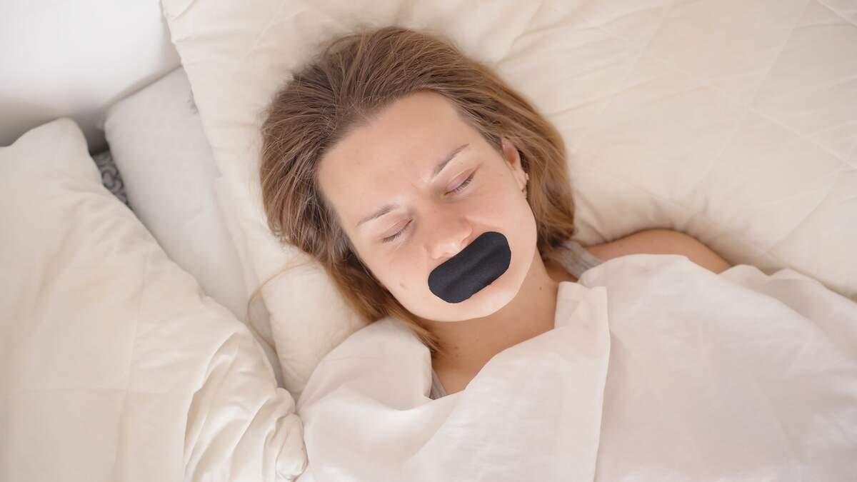 Thinking about mouth taping for sleep? Here's what doctors want you to know before purchasing