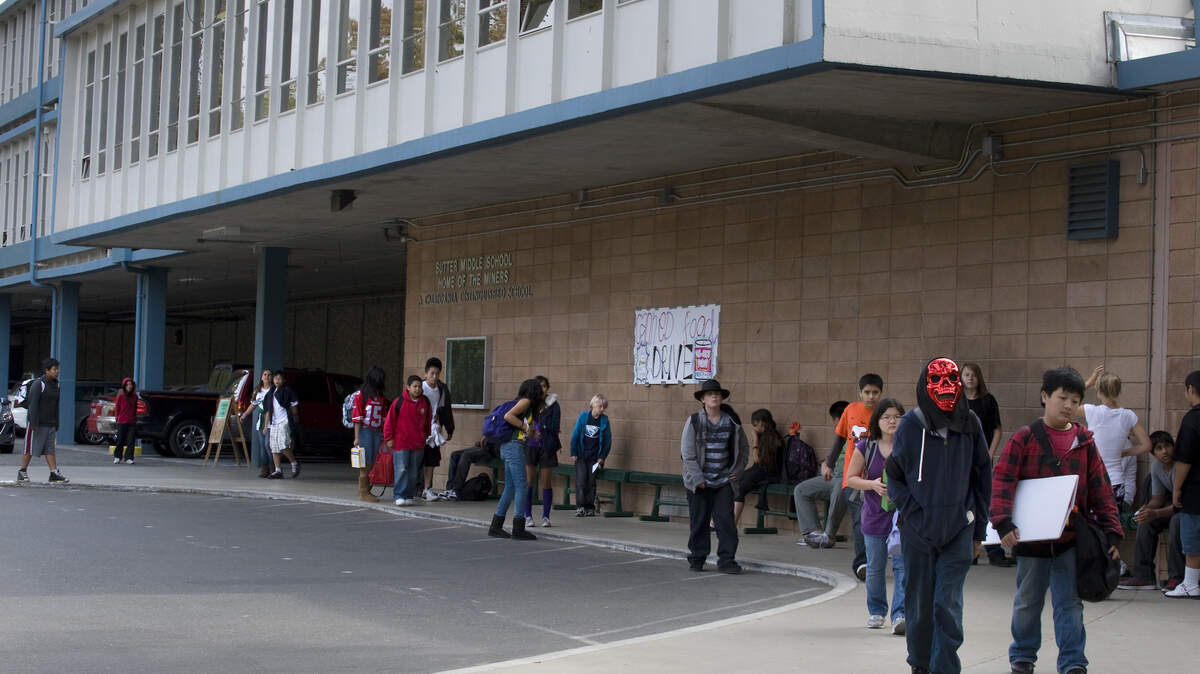 Students, some dressed for Halloween, leave school at the end of the day at Sutter Middle School on Friday, Oct. 29, 2010. The school will be renamed Miwok Middle School beginning in fall 2023.