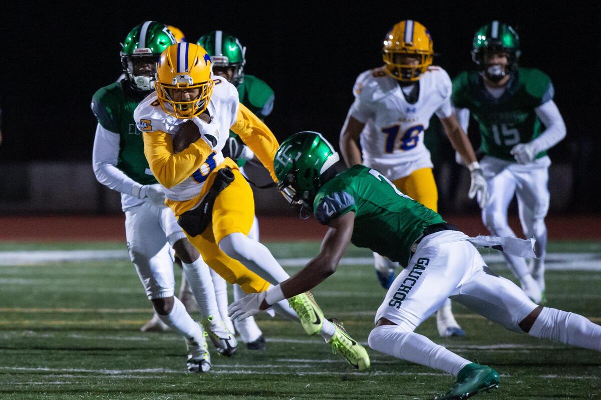 Grant Pacers Kyrell Goss-Pruitt (6) runs the ball for a first down during the first quarter in the CIF Division III-AA Northern California Regional Championship football game against the El Cerrito Gauchos on Friday, Dec. 2, 2022, at El Cerrito High School.