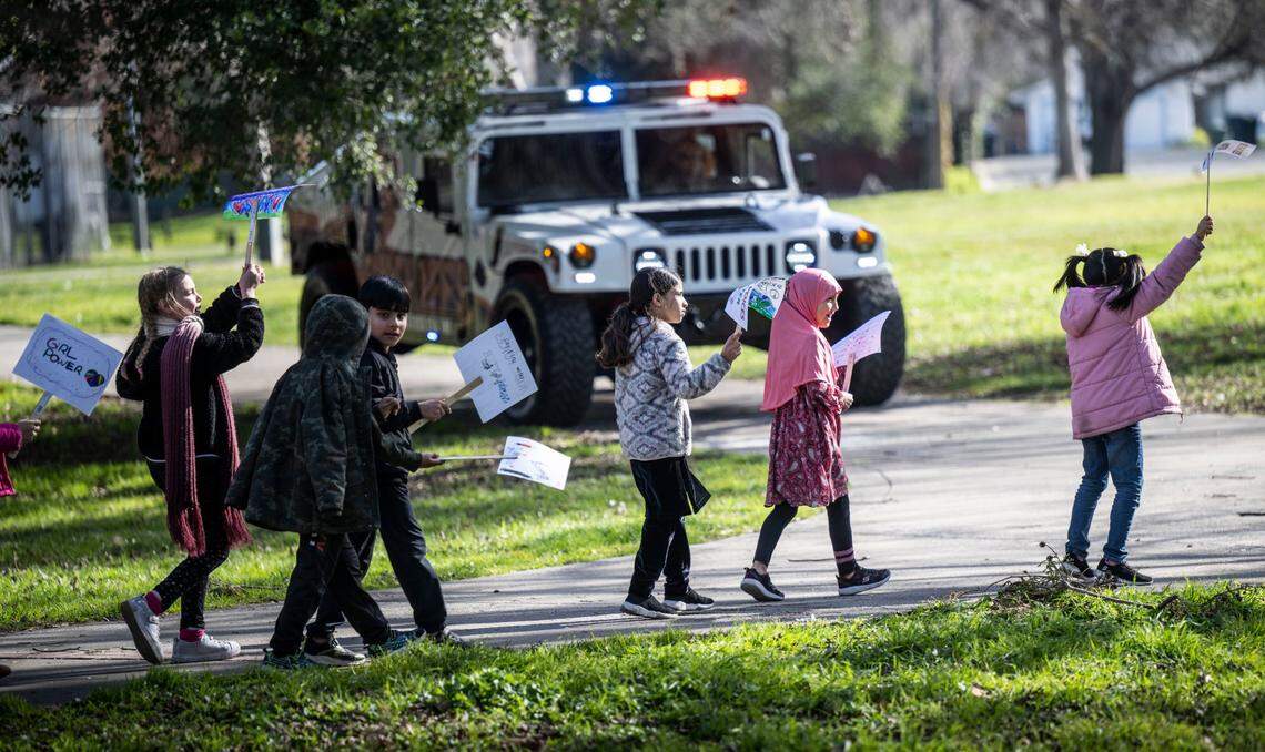Second grade students from Dyer-Kelly Elementary School march for student rights in front of the Sacramento County Sheriff’s Youth Services Unit at Bohemian Park in Sacramento County on Feb. 17. The march was a way for students, especially immigrants from destabilized countries, to have a positive interaction with police officers, according to Principal Jamal Hicks.