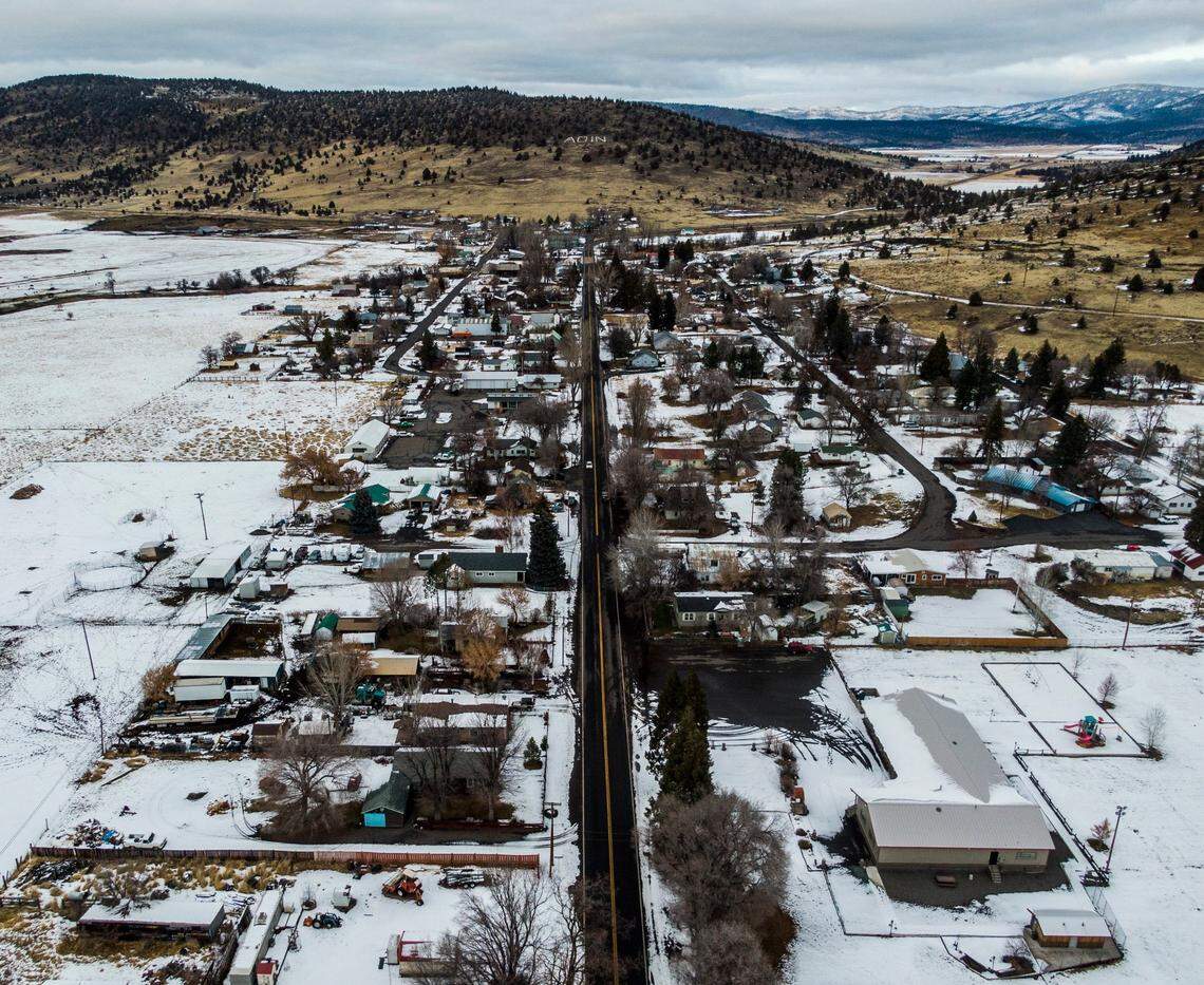 A car drives down Highway 299 in Adin earlier this month.