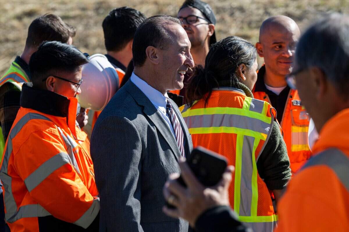 Caltrans Director Tony Tavares joins the ribbon cutting ceremony in Sacramento for the Interstate 5 enhancement project in October.