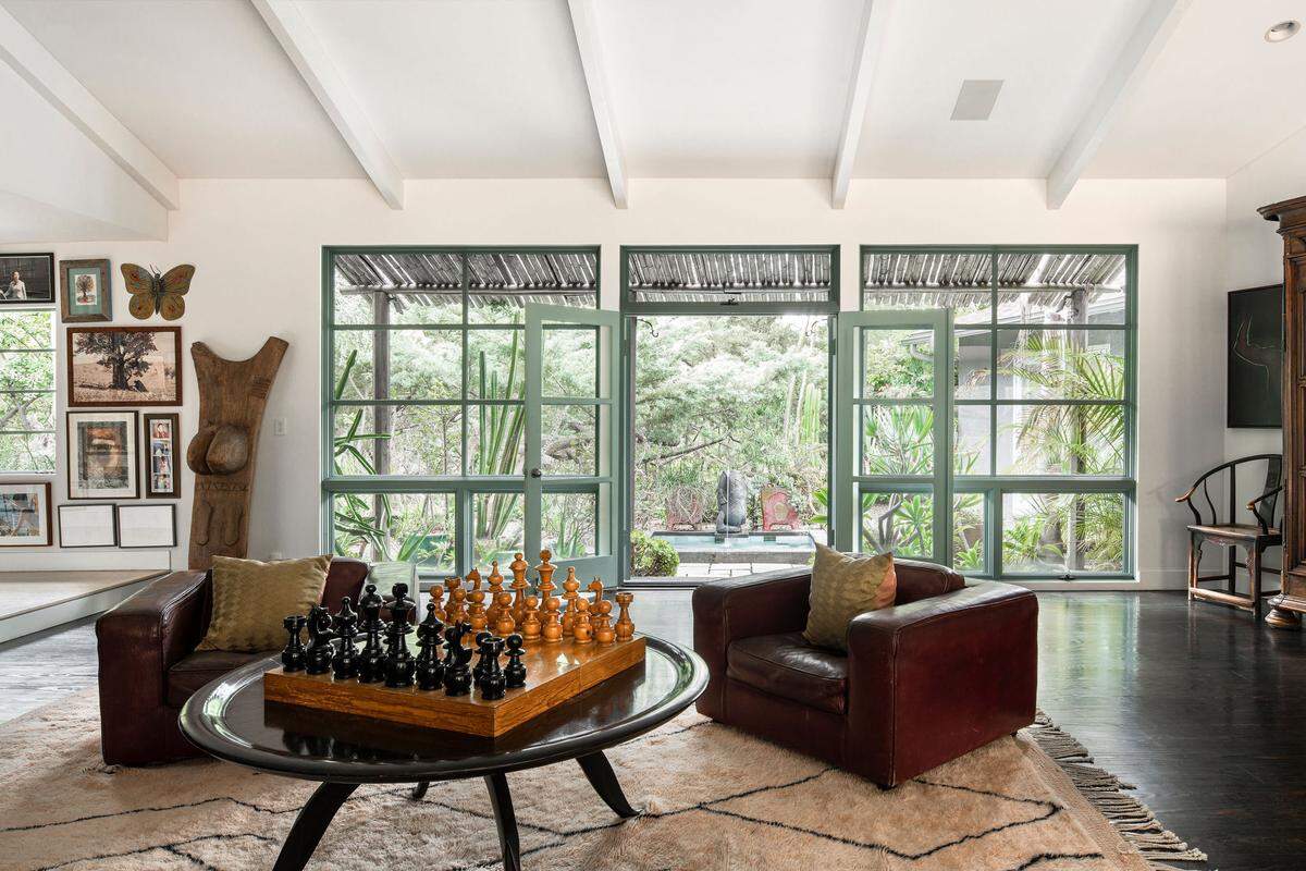 Once home and studio to iconic artist Ed Ruscha, this enchanting midcentury LA compound blends art, architecture, and whimsical gardens for an unrivaled live/work retreat.
