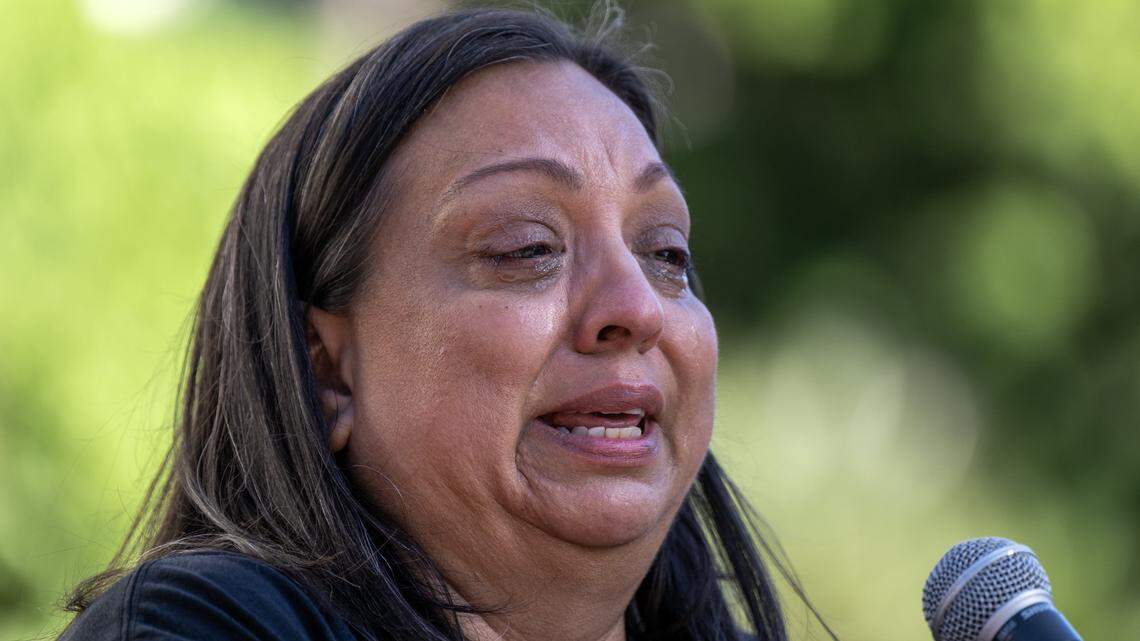 Amelia Snyder sheds tears as she talks about her son Julian, a victim of vehicular violence, to a crowd of families and supporters at a memorial rally at the California State Capitol in Sacramento on Thursday, April 23, 2026.