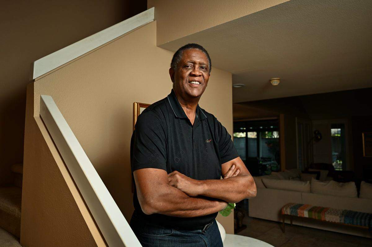 Former NBA star Bill Cartwright talks about his new book, “Living Life at the Center,” about his life as a professional basketball player earlier this month in his Gold River home. Cartwright grew up in Elk Grove and spent 16 years in the NBA playing for the New Knicks, Chicago Bulls and the Seattle SuperSonics.