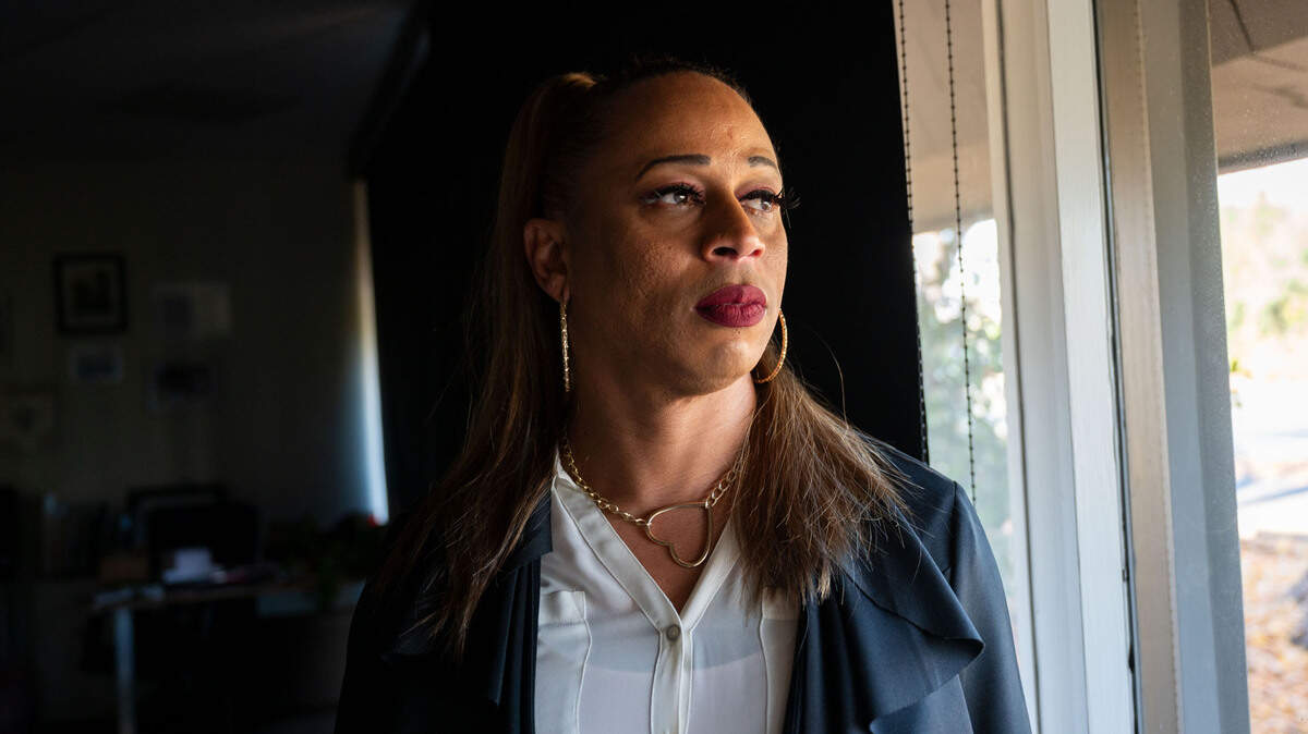 Jade stands at Volunteers of America’s offices in Sacramento on Dec. 4. She participates in a program called Open Arms in a small shelter run by VOA that serves individuals who are HIV-positive or living with AIDS. The shelter is asking Book of Dreams for funds to purchase a commercial refrigerator.