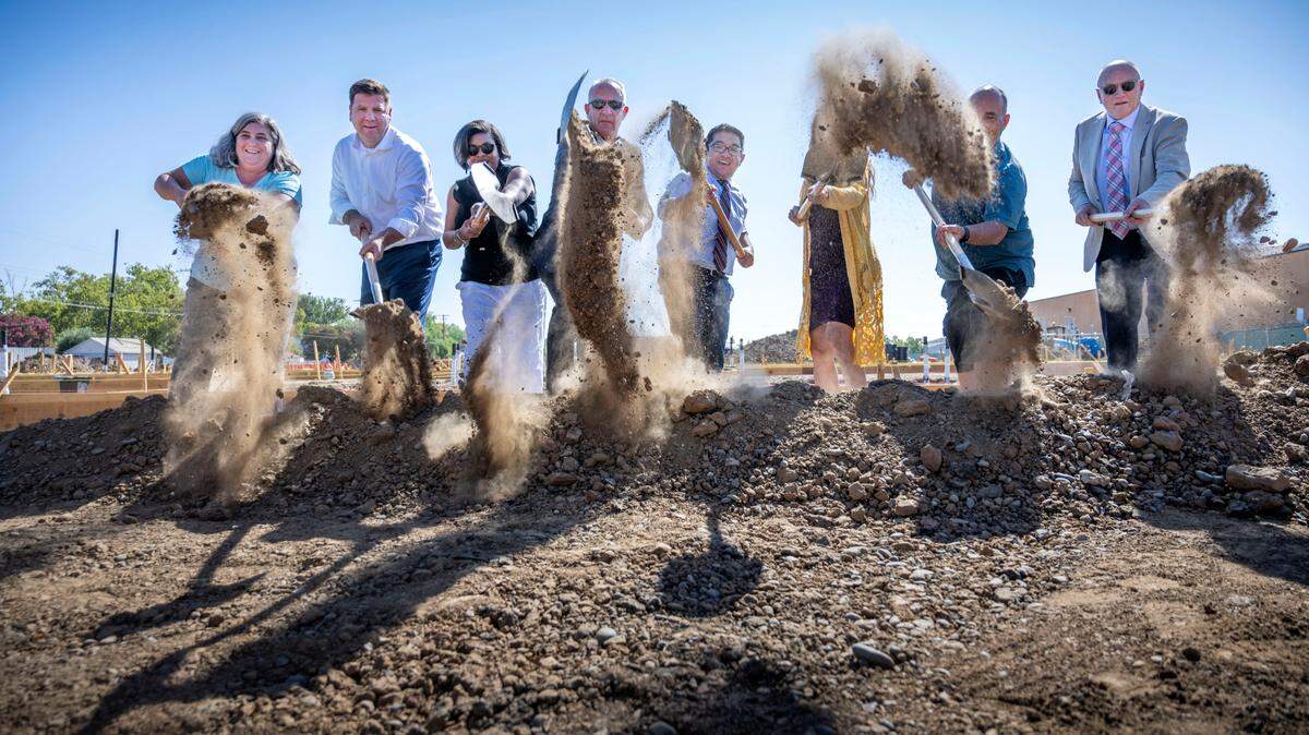 Dignitaries including Sacramento Mayor Darrell Steinberg, City Councilman Eric Guerra and California State Treasurer Fiona Ma ceremonially break ground at the new Mercy Housing project on Stockton Boulevard on Thursday. When completed, the development will have a total of 200 new homes.