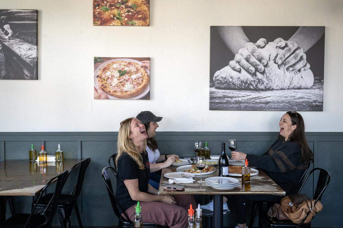 Lauren Titus, Lindsay Foletta, and Kathleen Gormley enjoy their lunch at Dodici Pizza on March 6.