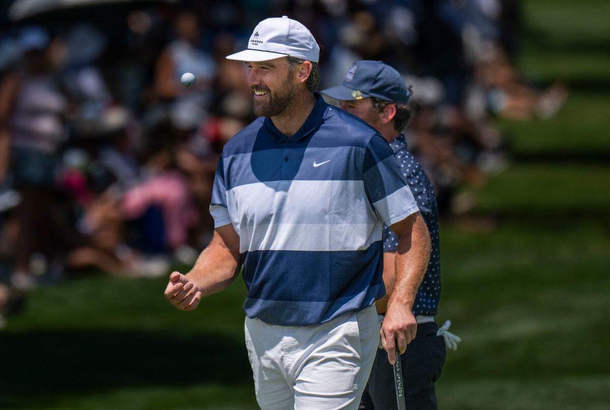 The Kansas City Chief’s Jason Kelce tosses his golf ball as he prepares to make his last shot during the final day of the American Century Championship celebrity golf tournament at Edgewood Tahoe Resort in Stateline, Nev., on Sunday, July 13, 2025.