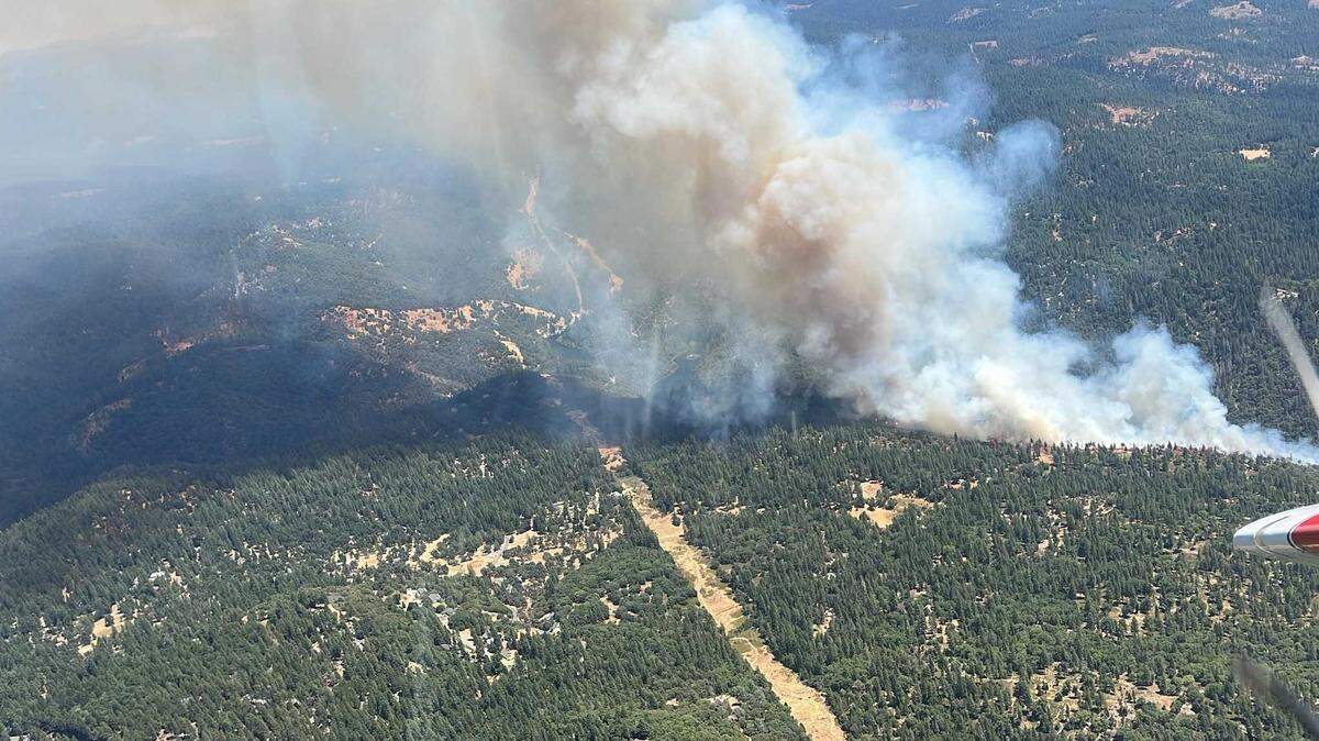 The Tiger Fire burns in Amador County on Friday. Mandatory evacuations were ordered on several roads in Pioneer.