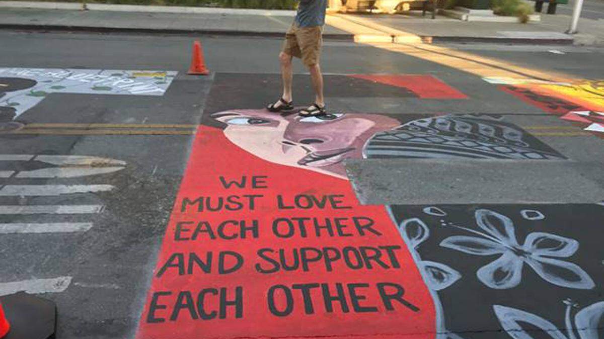 Five police officers sued Palo Alto, California, saying the Black Lives Matter mural with a New Black Panthers logo and an image of Assata Shakur is “discriminatory and harassing.”