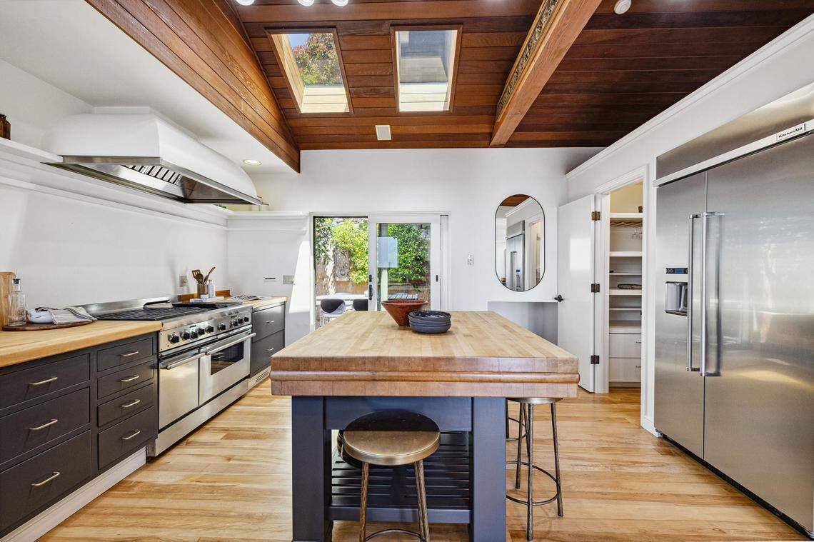 Ben McKee loves cooking in the modern Tuscan-inspired kitchen.
