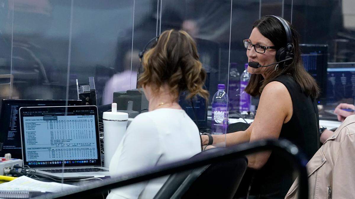 Broadcaster Kayte Hunter, left, and Krista Blunk speak during the first half of an NBA basketball game between the Sacramento Kings and the Cleveland Cavaliers at Golden 1 Center on Saturday, March 27, 2021. The two are among the announcing and coverage team, composed exclusively of women or non-binary members, during the in-game telecast, pregame and postgame shows, and social content for Saturday’s game.