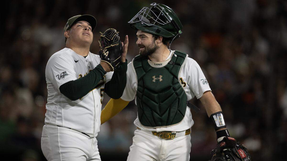 Pitcher José Suarez talks to catcher Shea Langeliers after a pitch at Sutter Health Park.