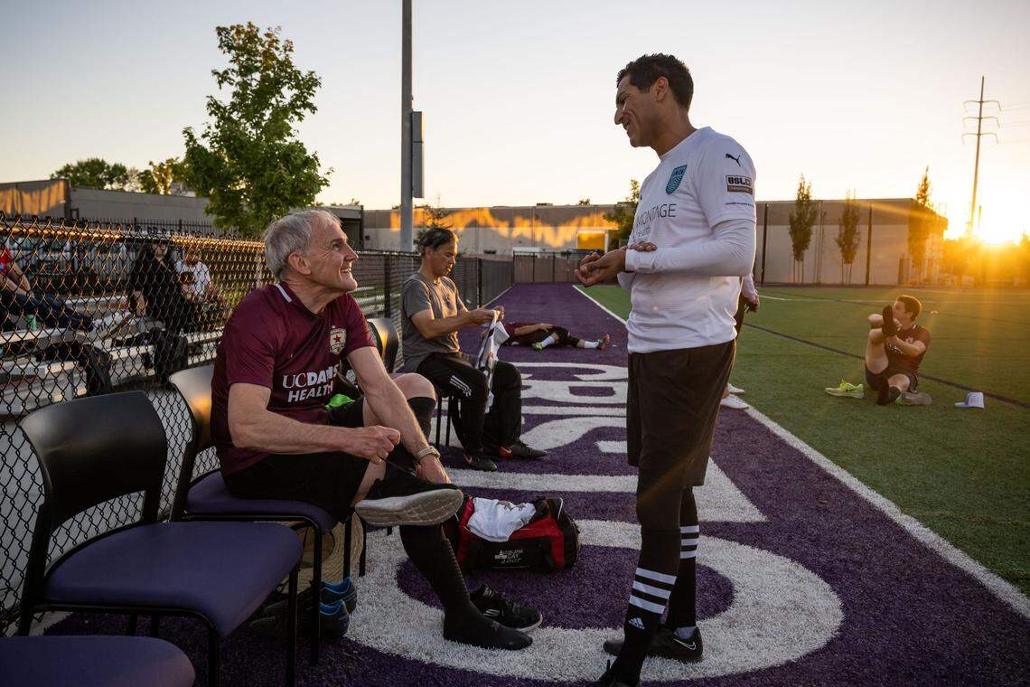 Southern California Assemblyman Steve Bennett, left, D-Ventura, ties on his shoes and chats with Northern California Assemblyman Robert Rivas, D-Salinas, before NorCal and SoCal state legislators face off in the annual Capitol Cup charity soccer game Wednesday at Cristo Rey High School in Sacramento. A check was presented to Stanford Sierra Youth and Families during halftime at the bipartisan match, which Sacramento Republic Football Club also helped make happen.