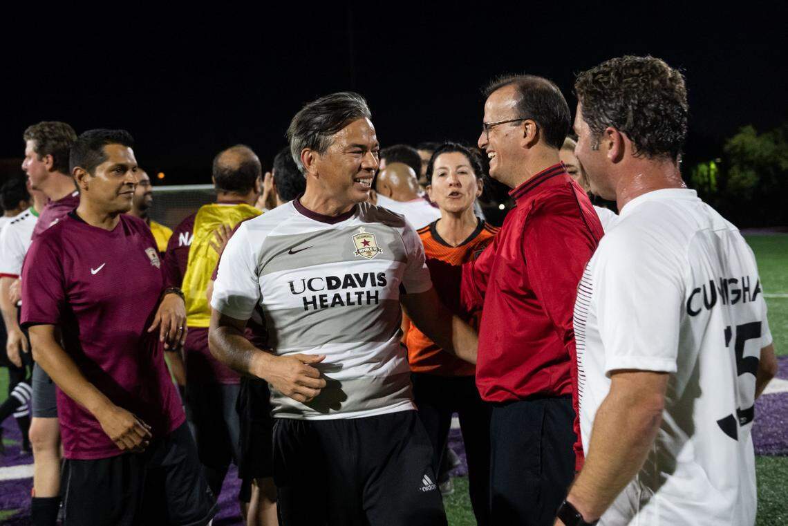 Three Northern California players who had key performances in their 5-2 win over Southern California California Attorney General Rob Bonta, center, goalkeeper and Assemblyman Marc German, right, D-Palto Alto, and Assemblyman Jordan Cunningham, far right, R-San Luis Obispo, mingle after this years annual Capitol Cup charity soccer game Wednesday at Cristo Rey High School in Sacramento. A check was presented to Stanford Sierra Youth and Families during halftime at the bipartisan match, with help from Sacramento Republic Football Club.