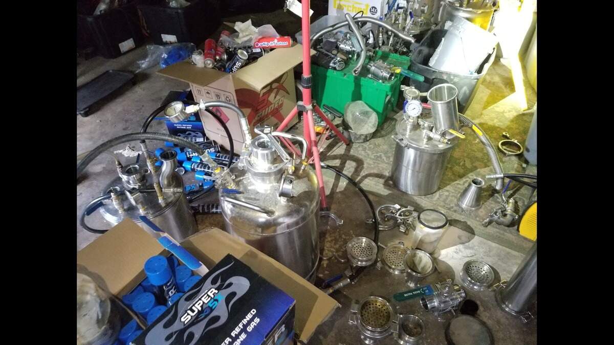 Detectives located 15,000 used canisters of butane at two Placerville homes, sites for an illegal butane honey oil operation, authorities said. Four people have been arrested.