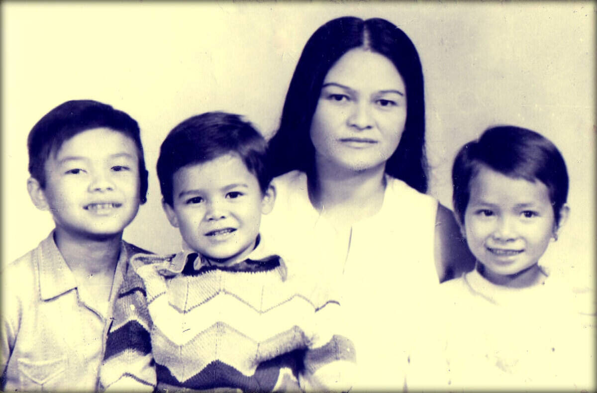 Hai-Ho Tran, left, with his family in Vietnam in 1979