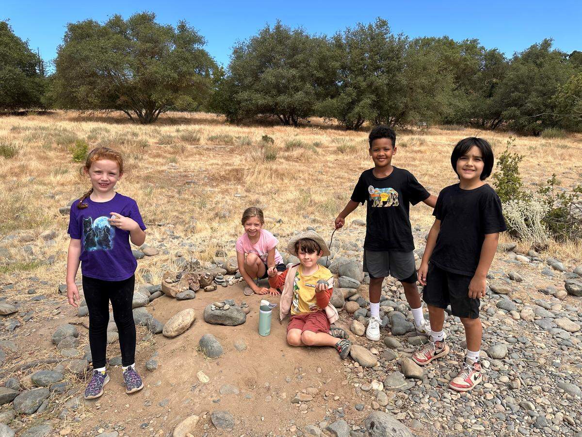 Day campers of the Effie Yeaw Nature Center explore the outdoors. These camps focus on helping kids develop skills like local wildlife tracking, investigating science topics, robotics and developing video games.