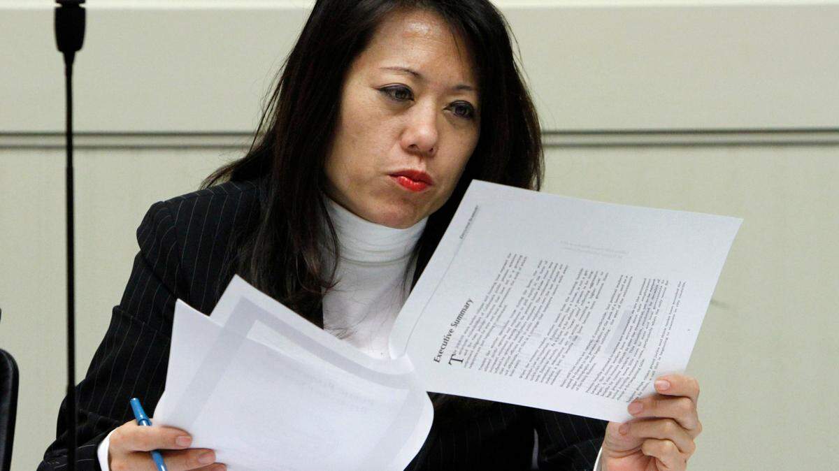 In this March 2, 2011, file photo, then-Assemblywoman Fiona Ma, D-San Francisco, looks over a copy of report during a joint legislative hearing at the Capitol in Sacramento, Calif. As California treasurer, Ma consistently charged taxpayers for her lodging in Sacramento throughout her first two years in office, a Sacramento Bee review of travel expense reports found.