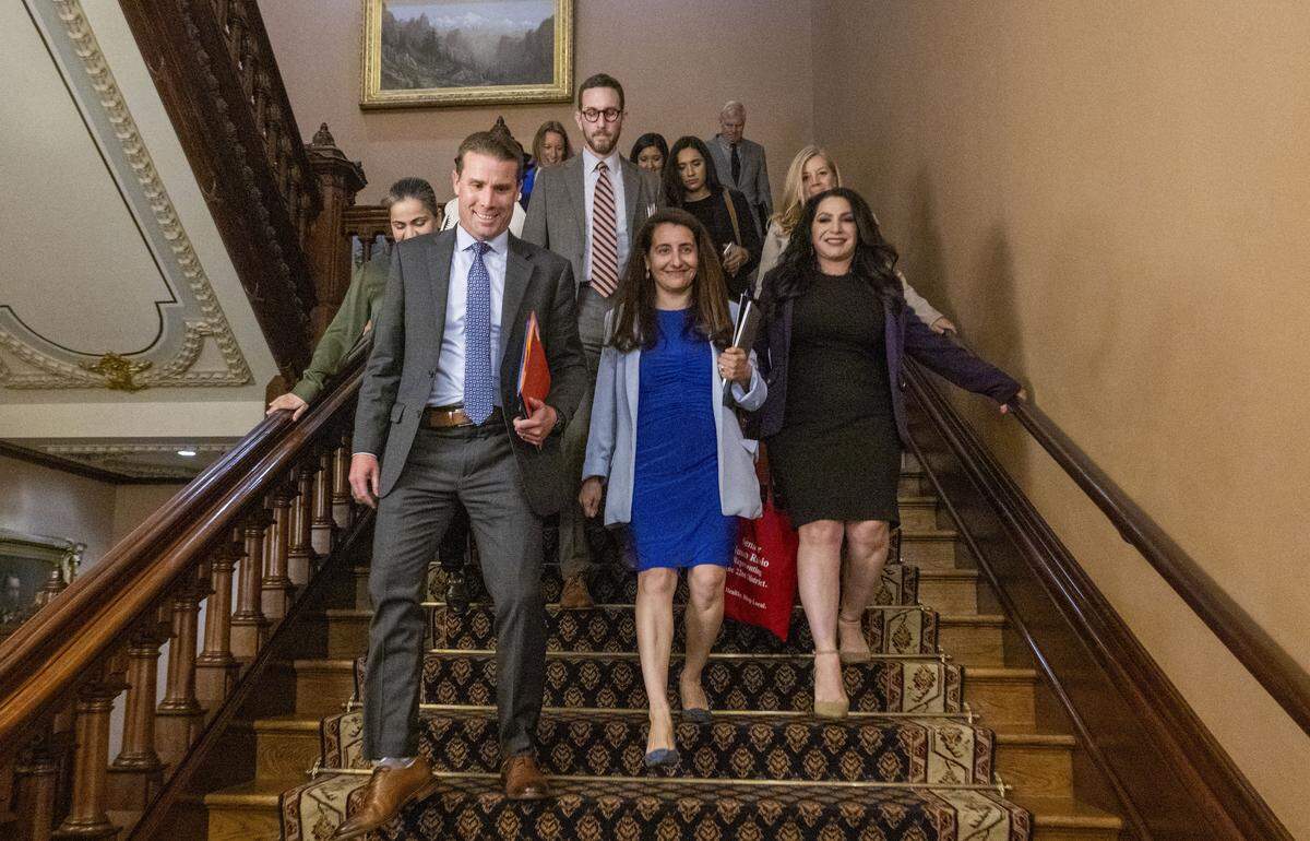 Senate President Pro Tem Mike McGuire, D-Healdsburg, left, walks down the stairs with state Sen. Monique Limón, D-Goleta, center, on Monday, June 9, 2025, at the state Capitol after the announcement that she would take over leadership of the chamber next year. She is the first Latina to lead the chamber. 