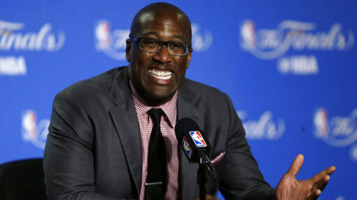 FILE - In this June 1, 2017, file photo, Golden State Warriors interim head coach Mike Brown answers questions during a news conference after Game 1 of basketball’s NBA Finals against the Cleveland Cavaliers in Oakland, Calif. Brown has a do-for-others nature and as the Warriors host Cleveland on Christmas Day everyone will remember exactly what he did to help guide Golden State to a second title in three years last June as he filled in for ailing head coach Steve Kerr. (AP Photo/Ben Margot, File)