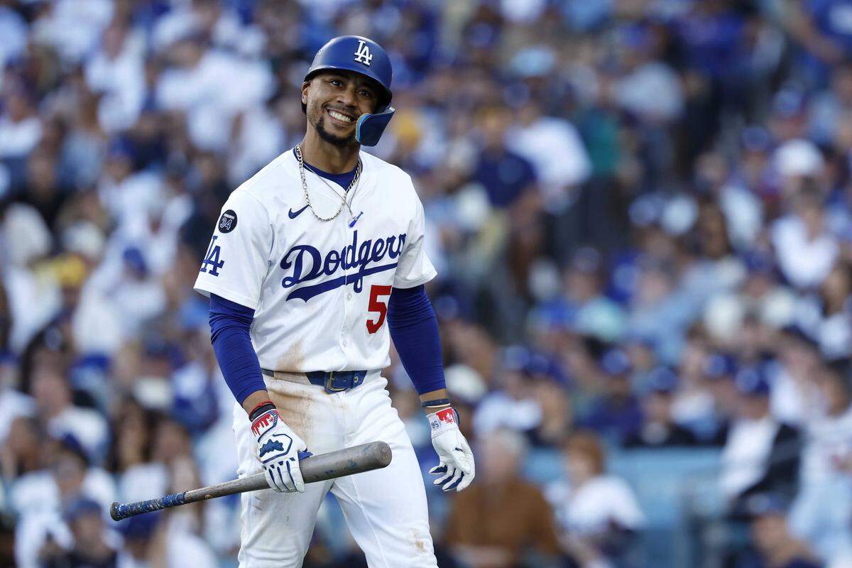 Mookie Betts of the Los Angeles Dodgers reacts after striking out during the fifth inning an Oct. 16 playoff game against the Milwaukee Brewers. Betts is an early adopter and investor in Core Impact, an Elk Grove sports tech company that tracks muscle activity in real time through sensor-enabled athletic wear.