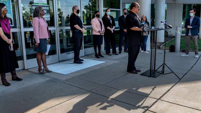 Richard Owen, right, with United Professional Educators, joined the Save Our Students Coalition demanding on Tuesday, Oct. 13, 2020, that the Sacramento City Unified School District and union leaders start meeting to resolve issues over instruction during the coronavirus pandemic and the district’s looming financial crisis in a press conference at the Serna Center in Sacramento.